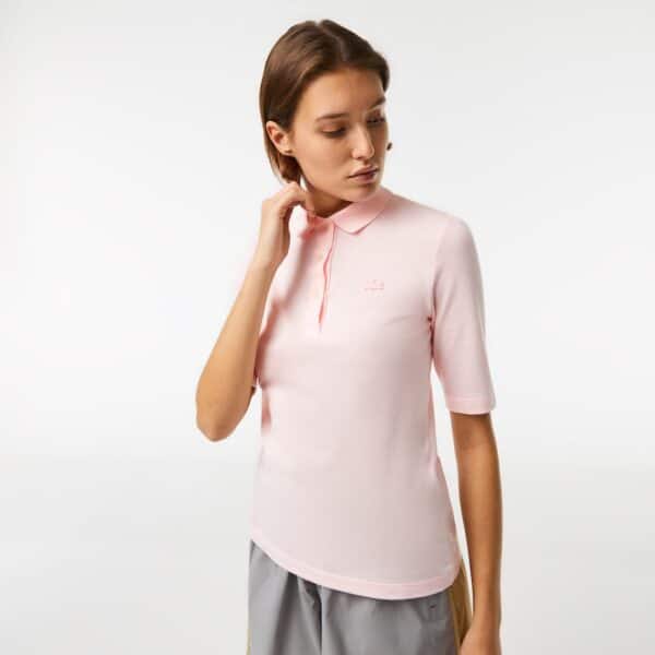 Klassieke Lacoste-damespolo van soepel vallend katoen licht roze mouw  tot elleboog